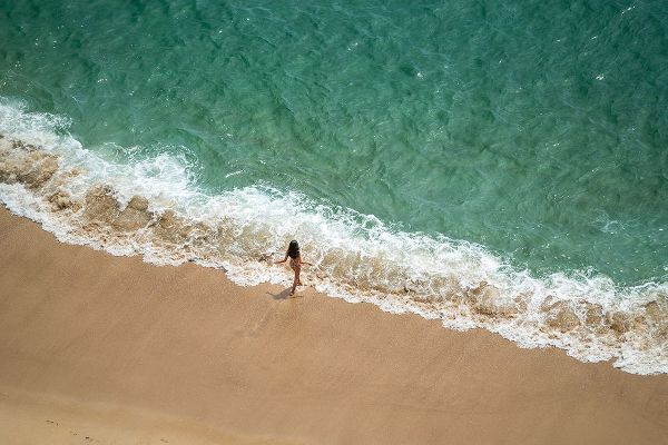 Jaynes Gallery 아티스트의 Europe-Portugal-Nazare-Girl in surf on beach작품입니다.
